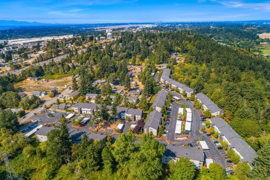 Aerial view of the property with lots of trees