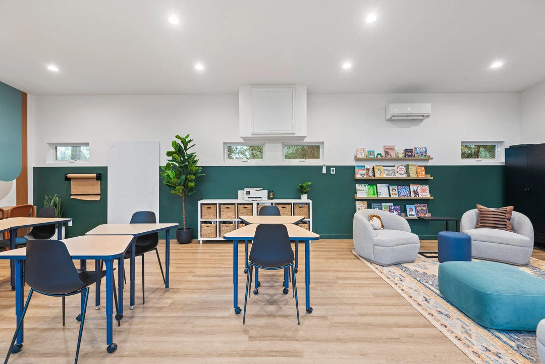 Children's lounge with flexible seating and colorful decor