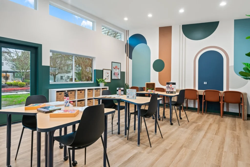 Kids club interior, flexible seating and activity stations