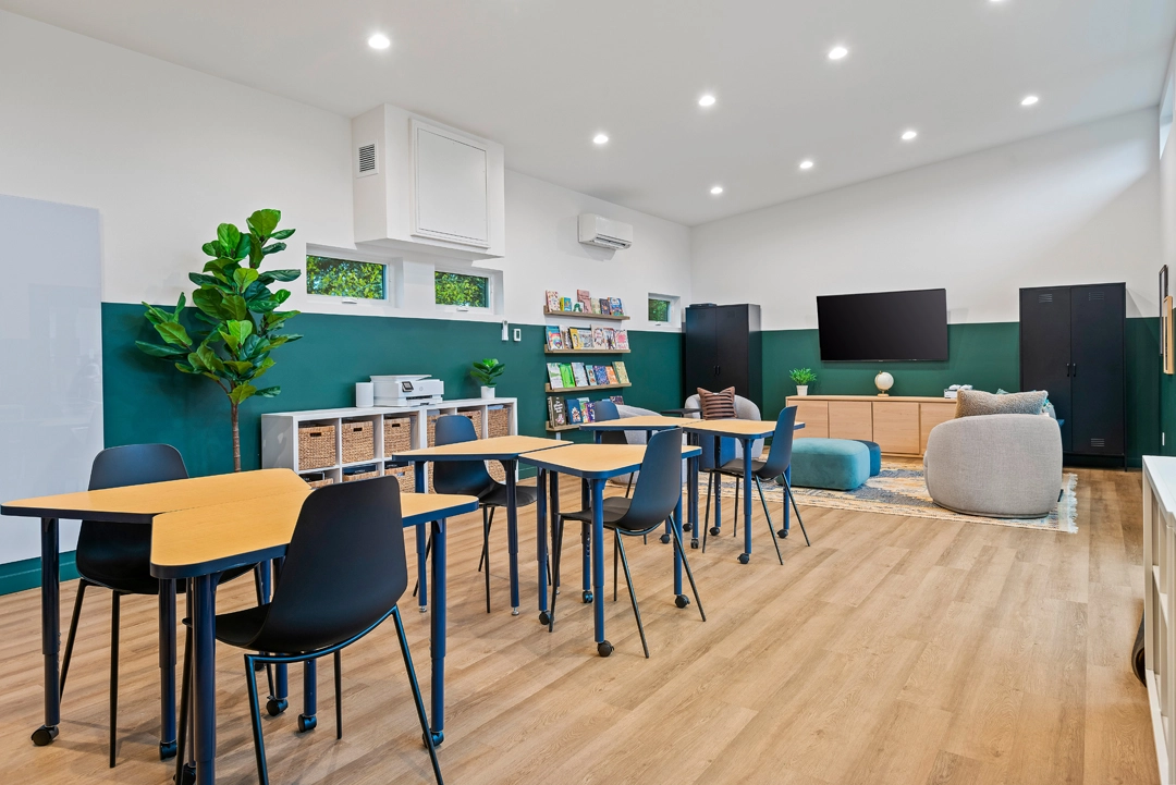 Kids club interior, flexible seating and activity stations